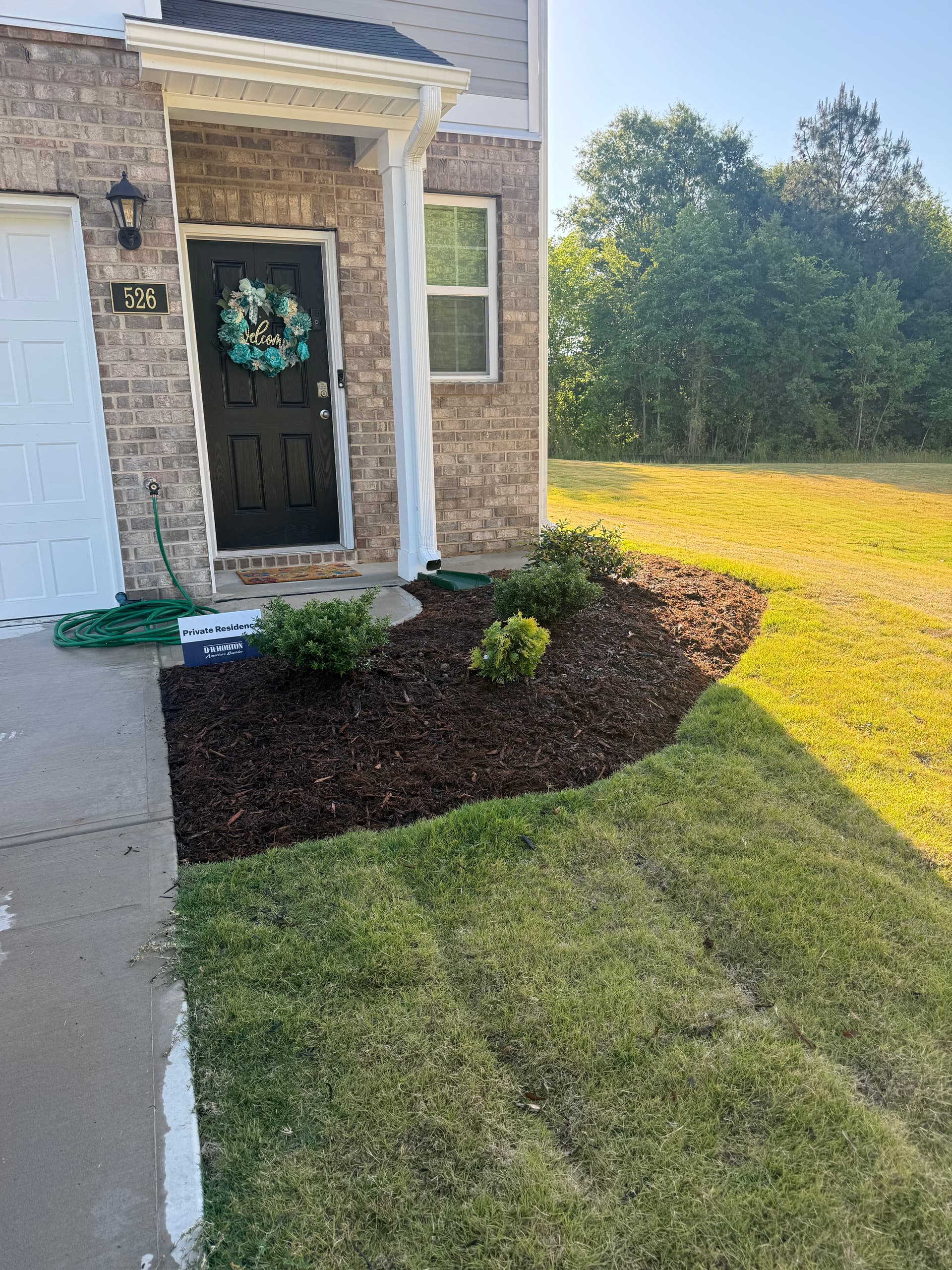 Ditching Builder-Grade Plants for a Cleaner Low-Maintenance Look in Gibsonville image