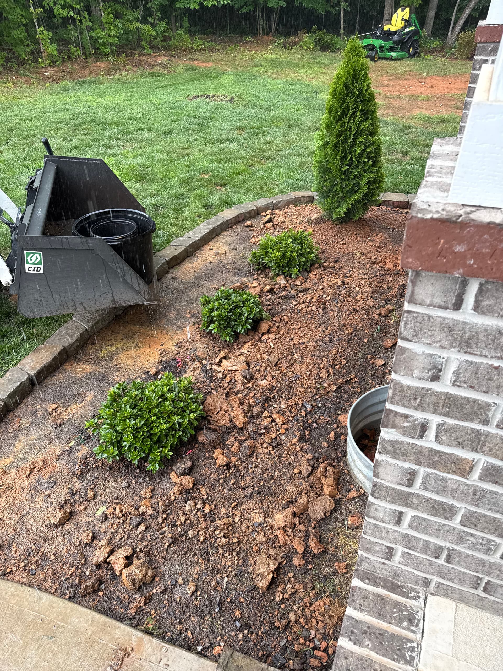 Gallery photos for Front Yard Bed Installation With Clean Edging and Low-Maintenance Plants in Gibsonville NC: Image #1